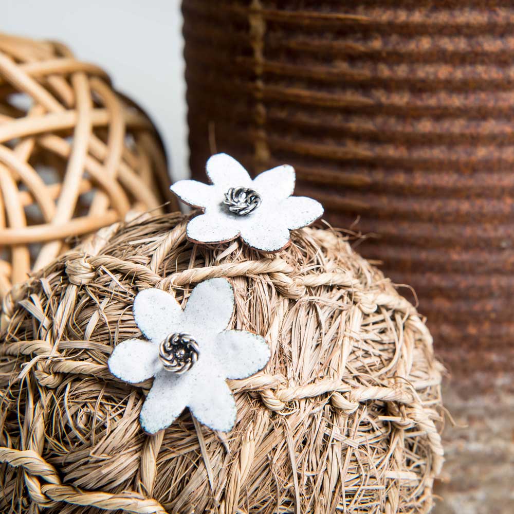Handmade jewellery displayed on string ball.