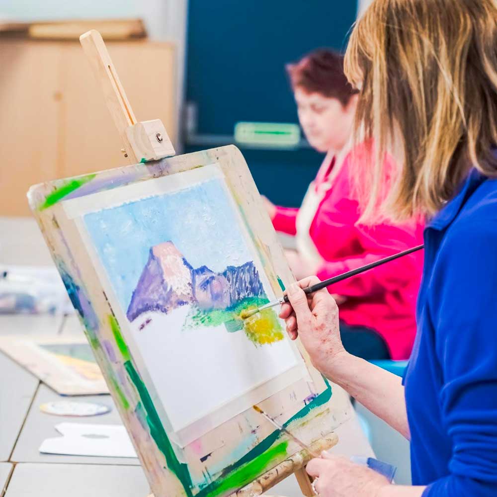 Learner painting watercolur landscape