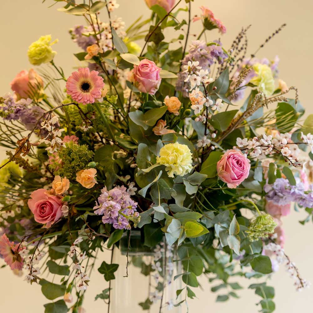 Flower arrangement with mixed blooms.