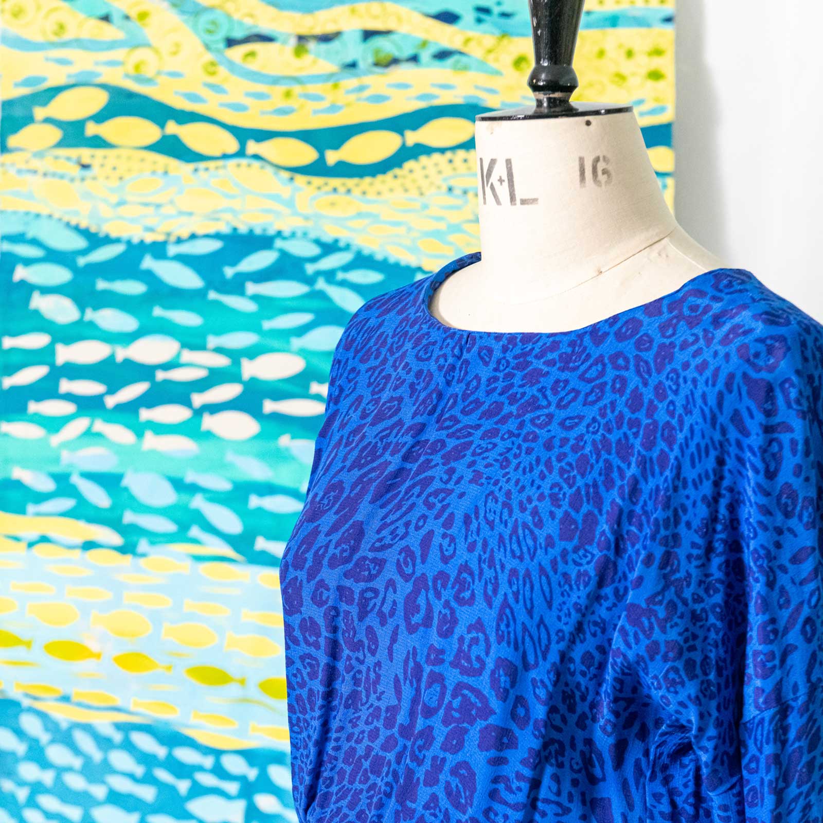 Blue dress on tailor’s dummy