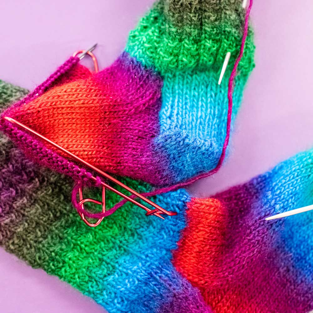 Colourful knitted and crocheted items.