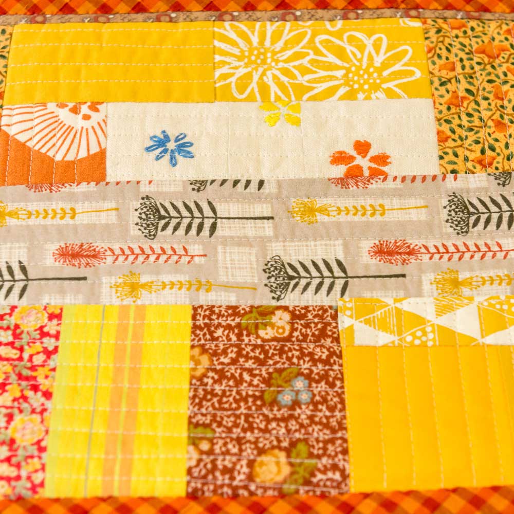 Patchwork quilt squares.