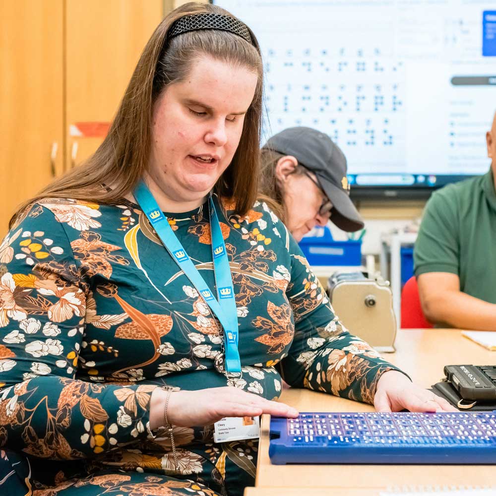 Learner practising braille.