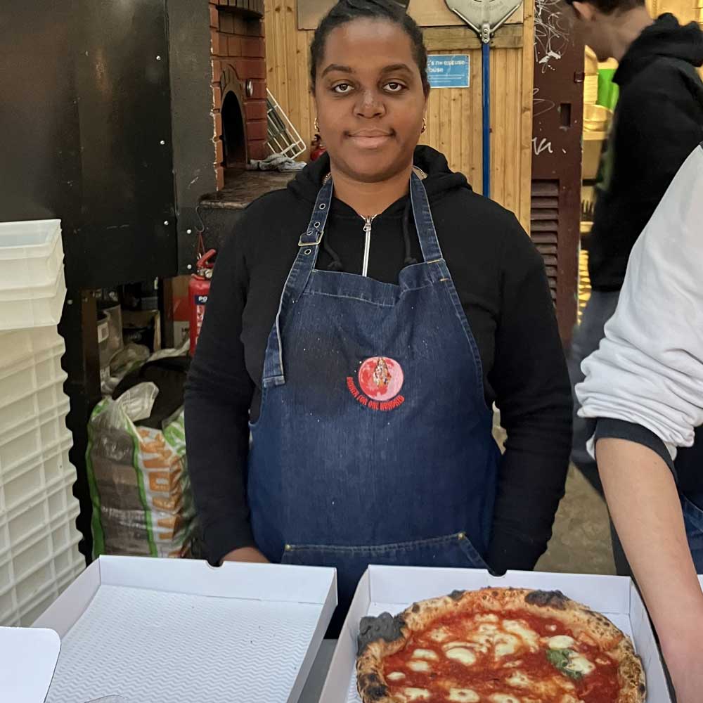 Learner gaining work skills in a kitchen setting.