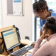 Adult learner being supported using a computer
