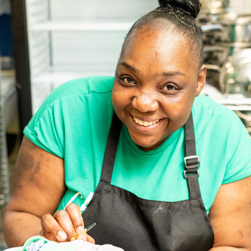 Learner decorating a cake